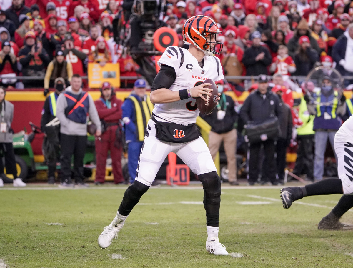 Jan 30, 2022; Kansas City, Missouri, USA; Cincinnati Bengals quarterback Joe Burrow (9) drops back to pass against the Kansas City Chiefs during the AFC Championship game at GEHA Field at Arrowhead Stadium. Mandatory Credit: Denny Medley-USA TODAY Sports